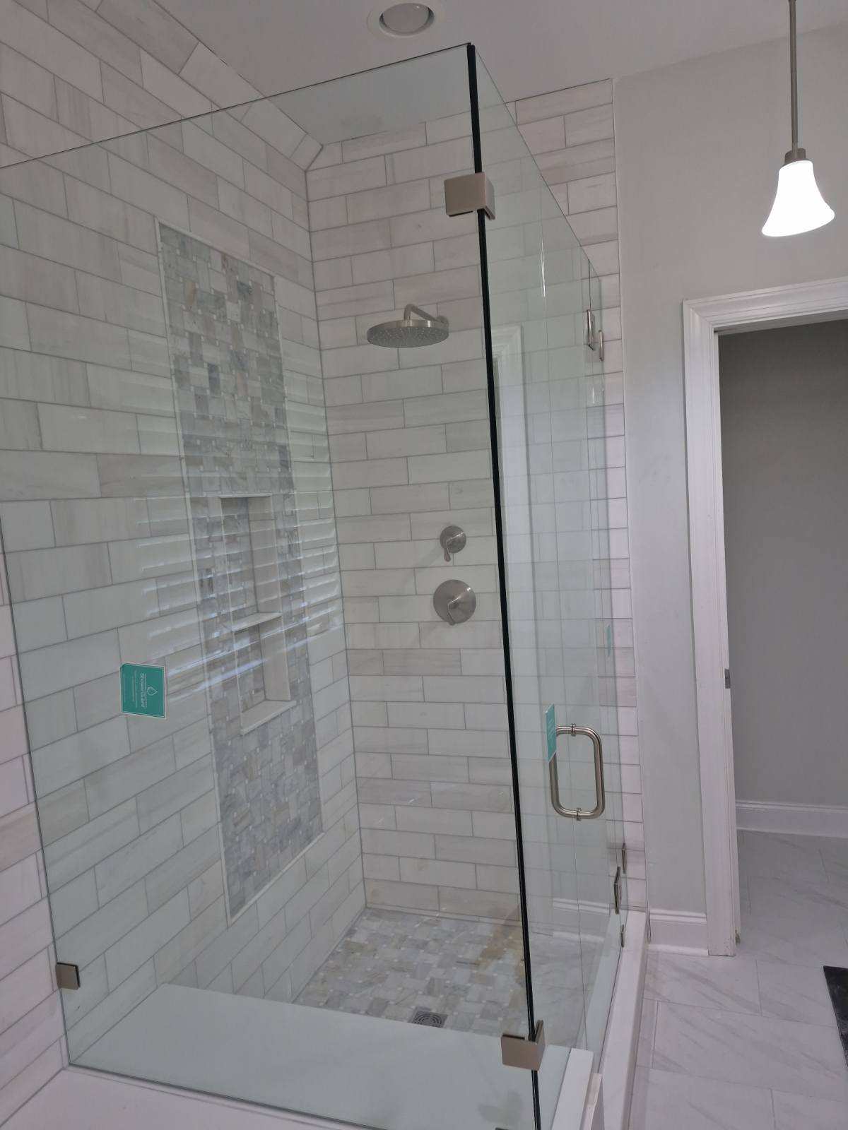 Large frameless mirror in a modern residential interior