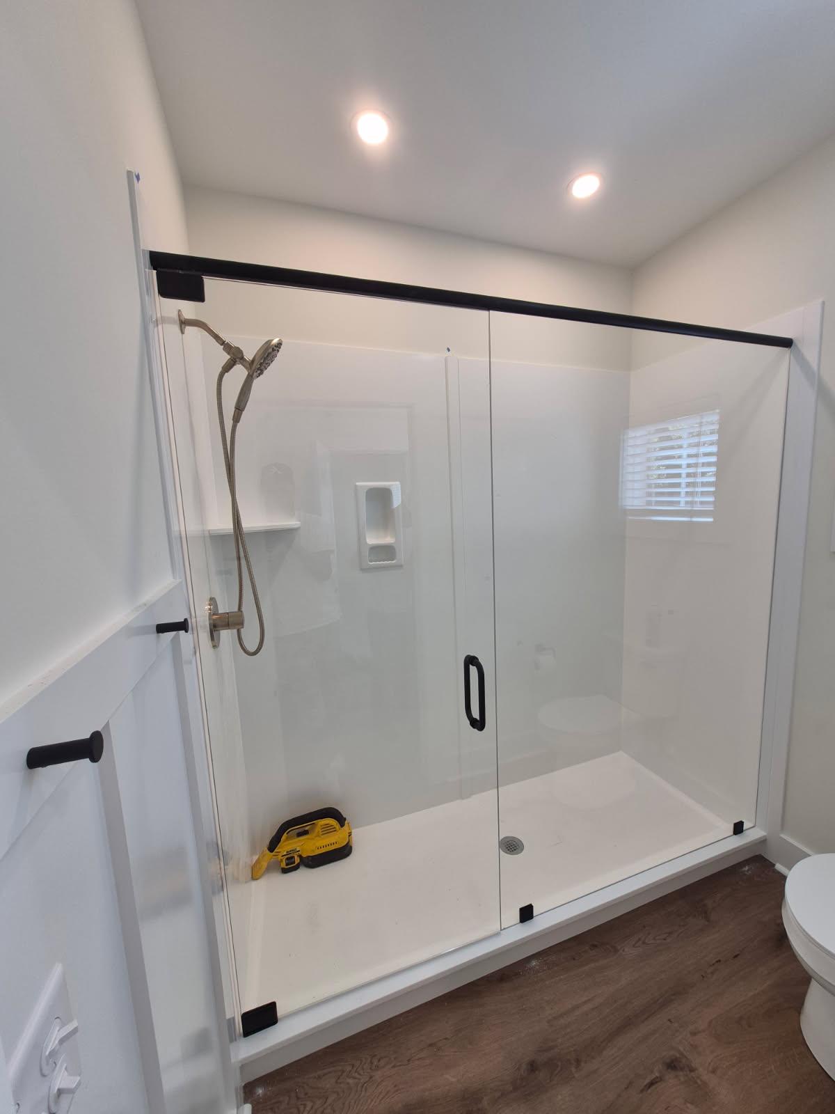 Custom glass shower enclosure